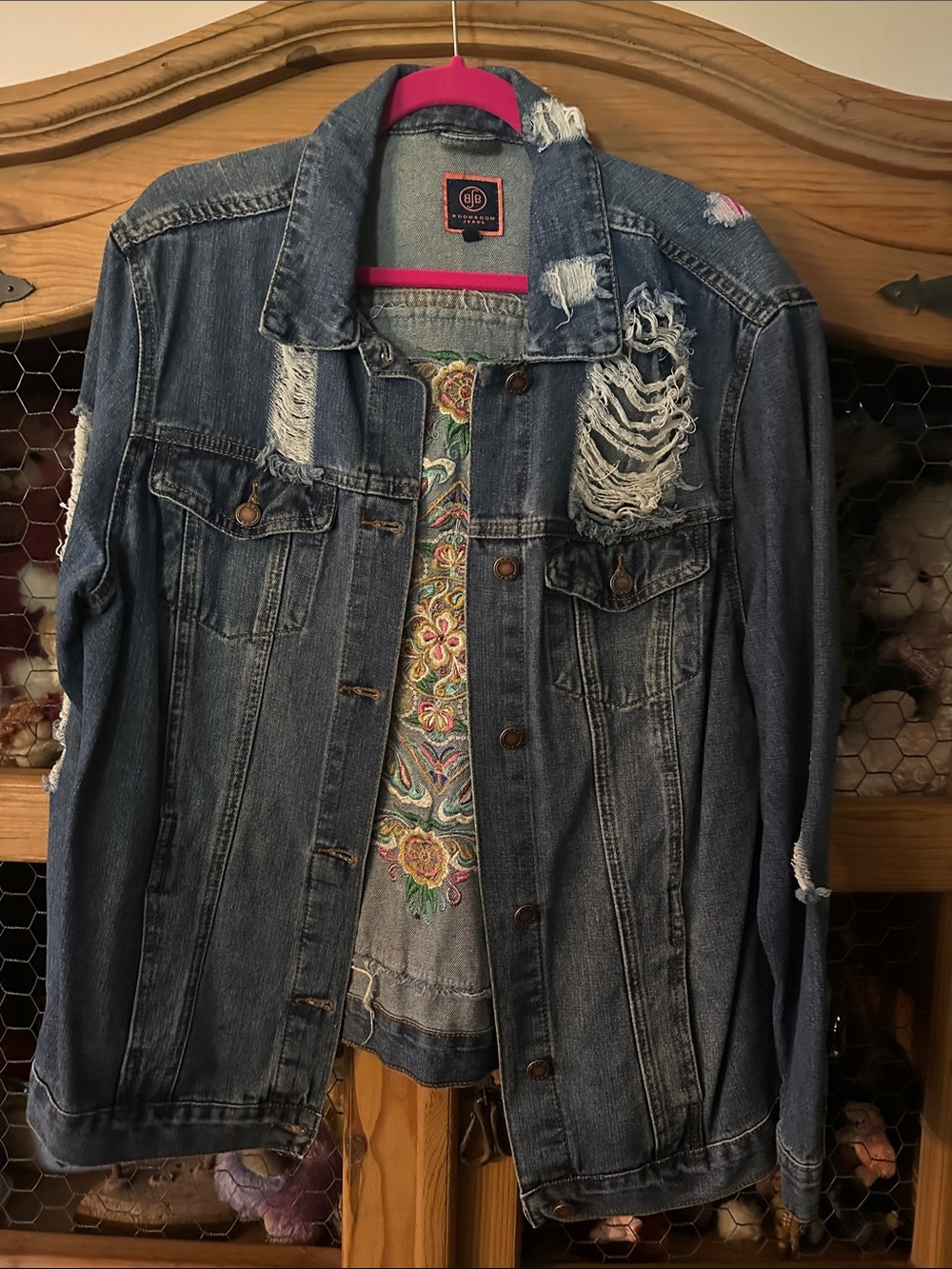 Distressed Blue Denim Jacket with Embroidered Back
